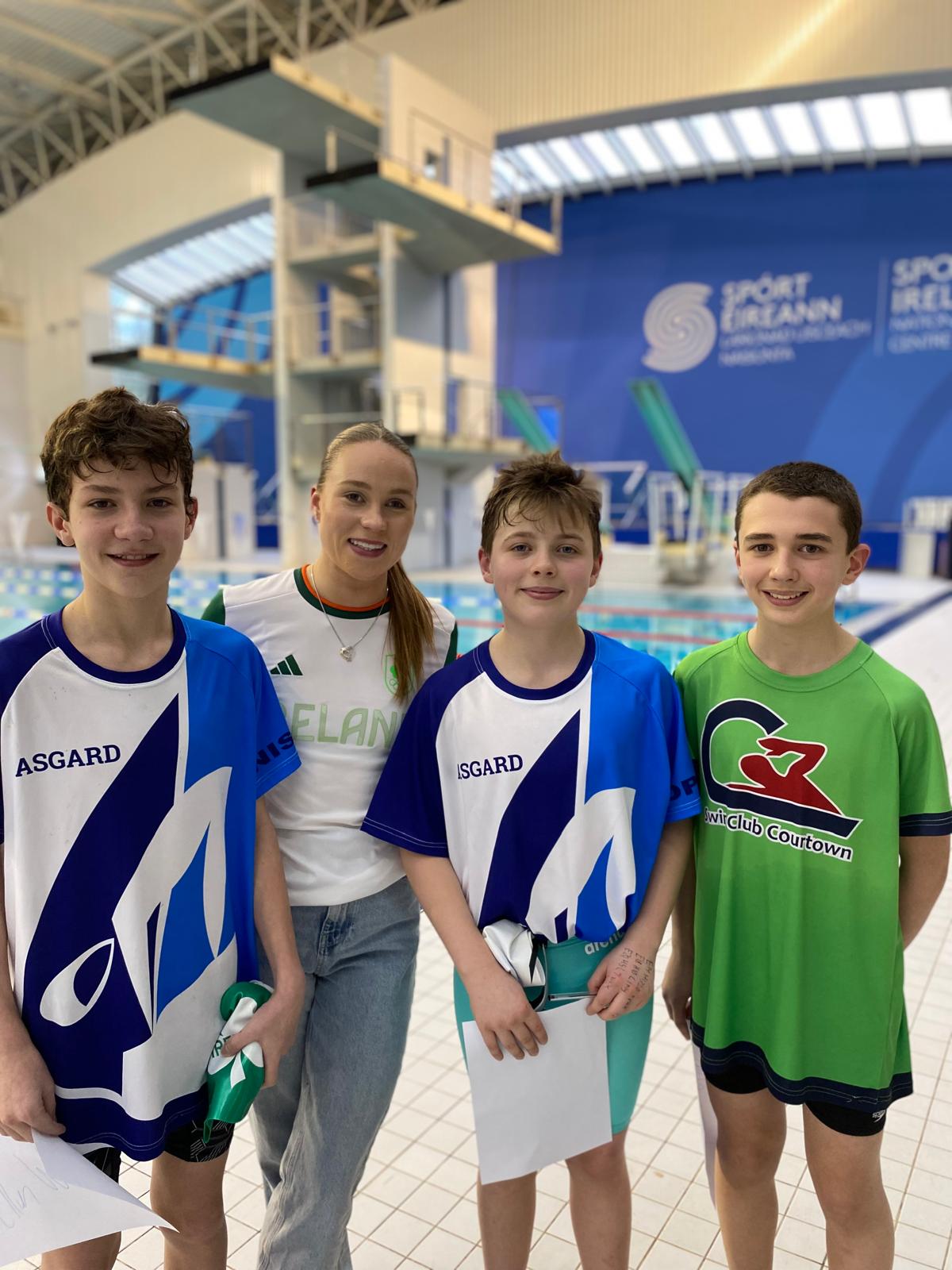 Group shot of swimmers with Ellen Walshe